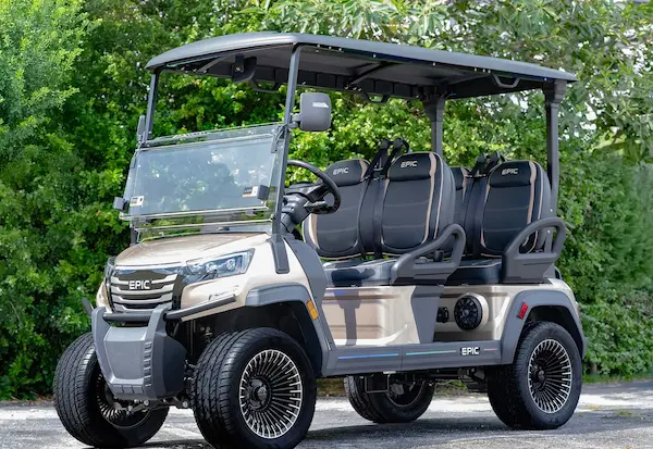 EPIC e40FX luxury 4-passenger lifted golf cart in champagne finish with custom wheels and plush black seats for Sarasota resort living