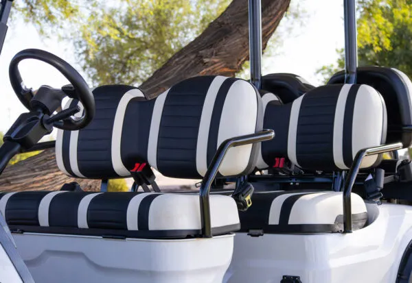 ICON i60L black and white rear bench seating with seatbelts and elevated suspension frame